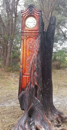 a tree stump with a clock carved into it