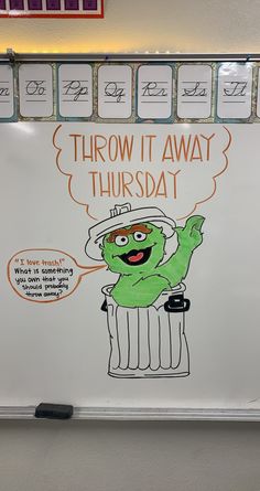 a white board with an image of a cartoon character in a hat on it's side