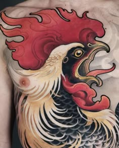 a man's chest with a rooster tattoo design on his upper half and side