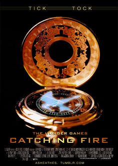 a movie poster for the film catching fire with an image of a gold pocket watch