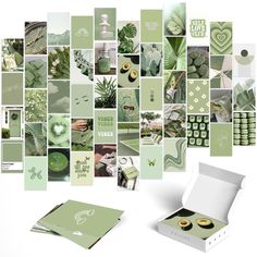 an assortment of green and white cards in a box