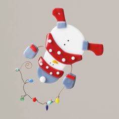 a snowman ornament hanging from the ceiling