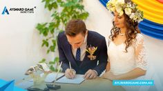 a bride and groom signing their marriage vows