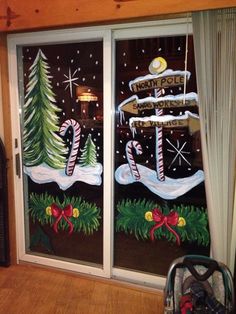 a decorated window with christmas decorations on it