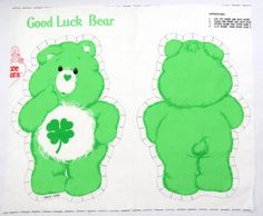 two green teddy bears with shamrocks on their chest and back, one in the shape of a bear