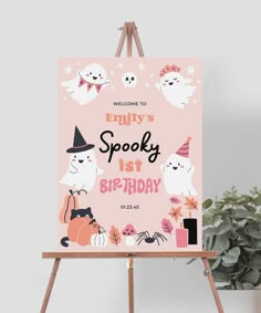 a sign that says, welcome to the spooky 1st birthday with ghost and pumpkins