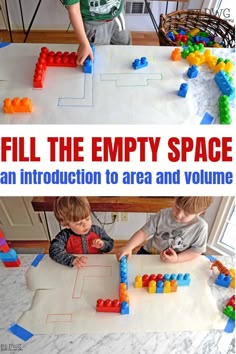 two children playing with legos on the floor and in front of an empty space