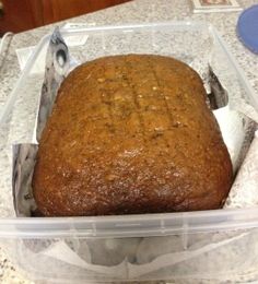 a loaf of bread in a plastic container