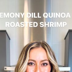 a woman standing in front of a stove with the words lemony dill quinoa roasted shrimp