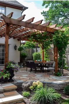 an outdoor patio with wooden pergoline and stone steps