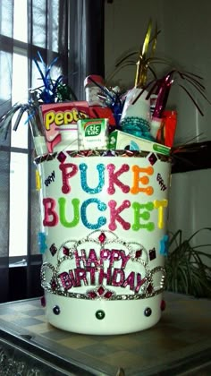 a bucket filled with lots of candy and candies