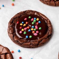 chocolate cookies with sprinkles and colored candies