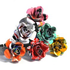 an assortment of colorful hair bows on a white background