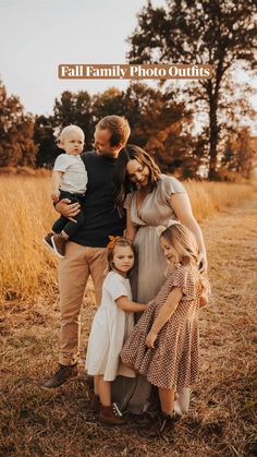 a family posing for a photo in the field with their toddler son and sister