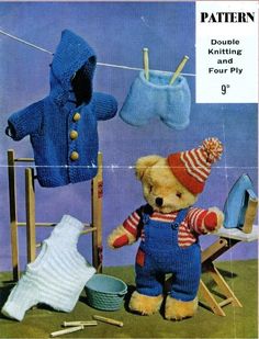 a teddy bear wearing overalls and knitted clothes on a clothes line with other items