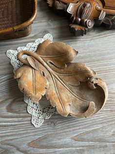 a wooden object sitting on top of a table