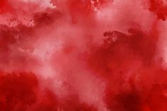 an abstract red and pink background with clouds