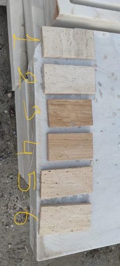 several pieces of wood sitting on top of a table