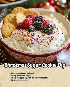 christmas sugar cookie dip with berries and sprinkles