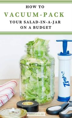 a jar filled with lettuce sitting on top of a table next to scissors