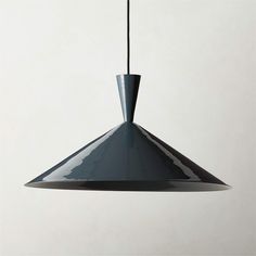 a black and silver light hanging from a ceiling