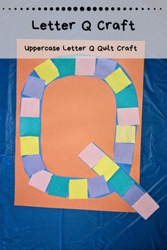 the letter q craft is made with colored paper