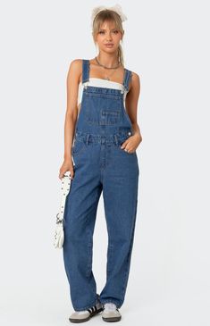 The denim craze continues with these overalls. These overalls are effortlessly casual with a relaxed fit for that cool girl feel. OverallsStraight leg fit Button detailing Pockets Belt loops100% CottonModel wears size SModel height is 5'6Item care: Machine wash at maximum of 30ºC, do not bleach, tumble dry low, iron at a maximum of 110ºC, do not dry clean. Edikted Womens Rosemary Denim Overalls - Blue size XS Baggy Overalls, Tap Costumes, Carhartt Overalls, Rompers Dressy, Winter Jumpsuit, Leather Jumpsuit, Best Summer Dresses, Jumpsuit Dressy, Swimsuit Dress