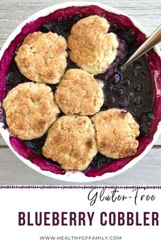 blueberry cobbler in a bowl with text overlay that reads glutter - free