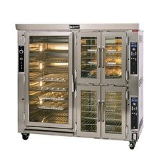 the double door oven is open and ready to be used for baking breads or pastries