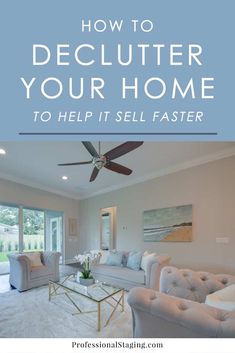 a living room filled with furniture and a ceiling fan