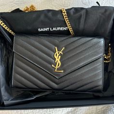 Ysl Black Cassandre Saint Laurent Matelass Purse With Gold Chain. Gorgeous Purse, And In Pristine Condition. I Have Only Worn This A Couple Of Times, I Just Don’t Use It Very Much. That’s Why I Am Selling It. Please Ask If You Have Any Questions. Again, This Purse Is Basically New. Great For Evenings Out Or Special Events. Retails For $1,600 Crossbody Purse Ysl, Black Ysl Purse, Ysl Black Purse, Cassandre Saint Laurent, Bags Ysl, Saint Laurent Bags, Yves Saint Laurent Bags, All Black Everything, Black Purses