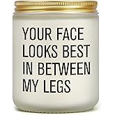 a white jar with the words your face looks best in between my legs