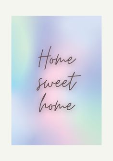 the words home sweet home written in black on a blurry blue and pink background