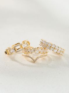 This three piece stacked ring set will be your new go to when you want to sparkle! This glitzy set features three 18k gold dipped crystal rings, perfect for layering with some basic bands! Wedding Branding, Camera Icon, Stacking Ring Set, Gold Dipped, Altar'd State, Crystal Rings, Three Piece, Stacking Rings, Ring Set