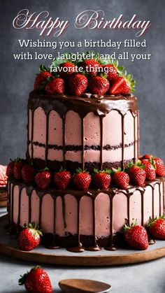 a birthday cake with chocolate frosting and fresh strawberries on the top is shown