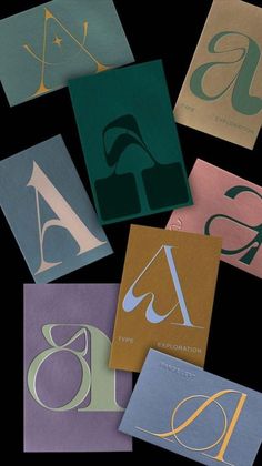 six different types of folded paper with the letter s on them in gold, blue, and green