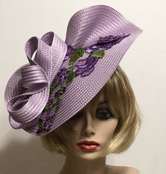 Lavender Derby Fascinator, Horse Race Hat, Kentucky Derby Hat, Races Fascinator, Rose Church Hat, Tea Party Hat, Wedding Guest Hat This elegant summer hat is perfect to wear to a Garden Party, Wedding Guest, Showers, Beach Wedding, Graduation, Church or Races. This hat is a Lavender Fascinator featuring a Multi Lavender embroidered accent piece with a matching 1" satin covered headband. Hats and accessories are not returnable. Please review our shop policies section if you have any questions, thank you. This hat for women ships free First Class Mail within one day. All hats are ready to ship in a perfectly sized box for the hat. Not folded.  When not wearing your hat you can display it on a dresser, bed corner, or anywhere to enjoy it. Each piece is uniquely made one at a time with much th Fitted Purple Hat For Spring, Fitted Purple Hat For Kentucky Derby, Lavender Fitted Hat With Curved Brim, Spring Purple Wide Brim Fascinator, Fitted Cloche Fascinator For Garden Party, Fitted Lavender Hats For Spring, Fitted Lavender Hat For Spring, Lavender Fitted Hat For Spring, Adjustable Lavender Hat For Evening