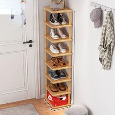 a wooden shoe rack with six pairs of shoes on it and the measurements for each pair