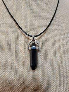 "Black Obsidian crystal pendant on a 20\" black cord adjustable necklace" Black Crystal Pendant, Obsidian Crystal Necklace, Black Casual Necklace With Adjustable Cord, Casual Black Jewelry With Adjustable Cord, Casual Black Necklace With Adjustable Cord, Spiritual Black Crystal Necklace With Adjustable Cord, Casual Black Pendant Jewelry, Black Crystal Necklace With Adjustable Cord, Adjustable Black Crystal Pendant Necklace