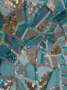 blue and gold sequins on fabric