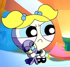 the powerpuff character is holding a toy in front of an orange and blue background