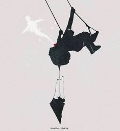 a person hanging upside down on a rope in the air with their feet dangling off