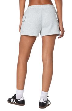 Soft cotton fleece adds cozy comfort to these relaxed shorts popped with on-trend cargo pockets for an ultracool look. Elastic waist Cargo flap-patch pockets 100% cotton Machine wash, dry flat Imported Sporty Cotton Shorts With Multiple Pockets, Sporty Cotton Bottoms With Multiple Pockets, Comfortable Relaxed Fit Athletic Shorts With Pockets, Comfortable Athletic Shorts With Pockets And Relaxed Fit, Comfortable Shorts With Pockets, Sporty Short Bottoms With Cargo Pockets, Sporty Short Length Bottoms With Cargo Pockets, Cotton Cargo Shorts In Athleisure Style, Cotton Athleisure Shorts With Cargo Pockets