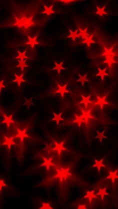 red stars are arranged in the shape of an abstract background