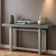 The concrete surface texture and minimalist style console table is a unique and stylish piece of furniture that is perfect for those who want to achieve a modern and industrial look in their living space. With its clean lines, compact footprint, durable materials, versatile use, and easy assembly, it is an excellent choice for any home or office. Latitude Run® Table Base Color: Gray, Table Top Color: Gray | Latitude Run® 59" Solid Wood Console Table 32.0 H x 59.0 W x 16.0 D in grayWood in Gray / Style Console Table, Wood Console Table, Wood Console, Surface Textures, Table Base, Accent Furniture, Minimalist Style, Assemblage, Console Table