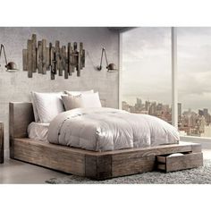 a bedroom with a bed, nightstands and large window overlooking the cityscape