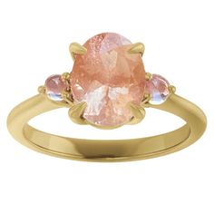 This beautiful ring's ethereal glow of moonstone and shimmering light peach Oregon Sunstone embodies a peaceful reflection, sure to uplift the heart of its beholder. Details: Material: 14K Gold band and prong setting Center Gemstone: 8.5 x 6.5 mm Oregon Sunstone, oval Accent Gemstones: 2.40 mm Moonstone, round Dimensions: 2.5 mm Approx. Shank Base Width, 5.73 mm Approx. Top Height Your Order Includes: Vintage Style Velvet Ring Box Cleaning and Polishing Cloth Ethical Sourcing Recycled Precious MetalsMade in USA Peach Moonstone Ring, Oregon Sunstone, Shimmer Lights, Yellow Jewelry, Peach Moonstone, Knot Earrings, Light Peach, Ring Pendant Necklace, Moonstone Ring