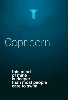 the words capricorn are written in white on a dark blue background with an underwater photo