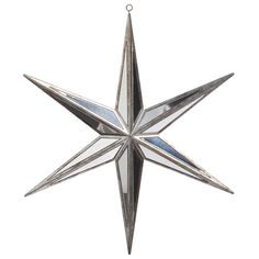 a silver metal star ornament hanging from a chain on a white background,