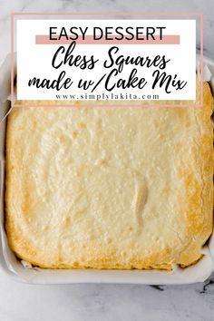 an easy dessert cheese squares made with cake mix in a white baking dish on a marble countertop